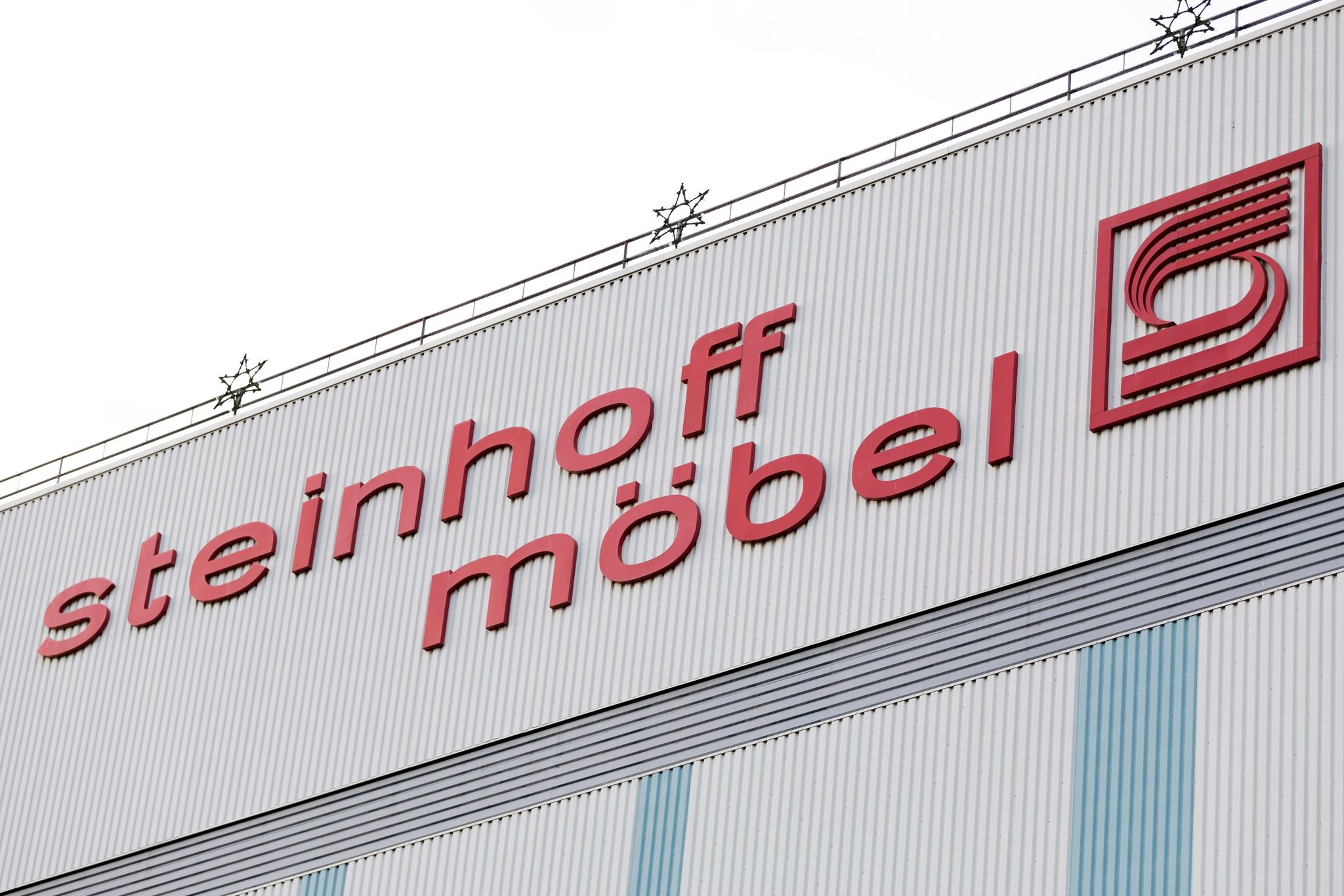 Der Schriftzug «Steinhoff Möbel» An Einem Gebäude.